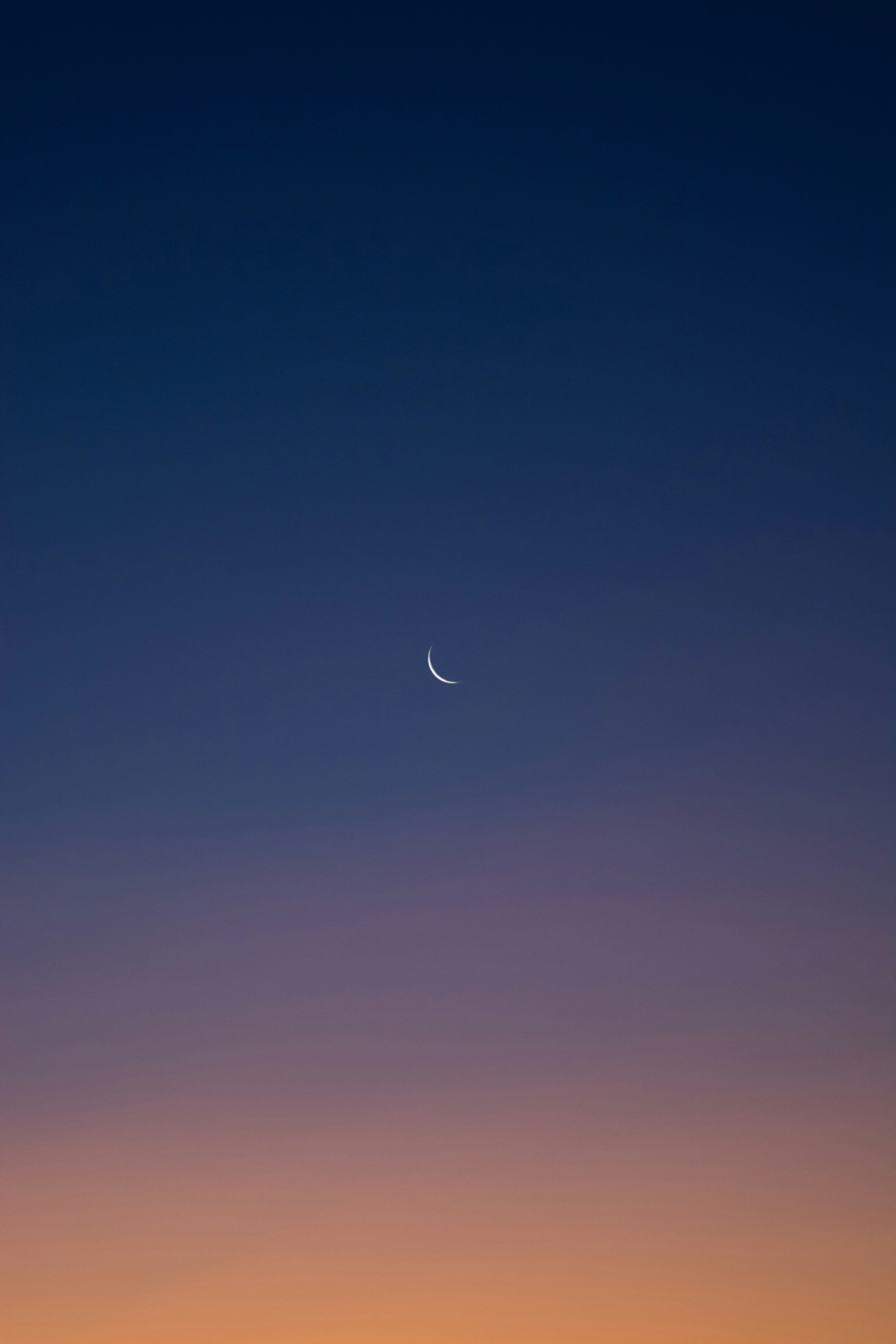 blue sky with white clouds during night time